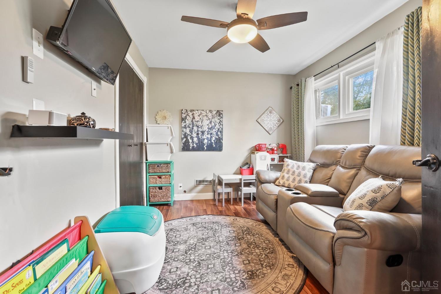 26 Sunrise Road Old Bridge, NJ 08857 - Photo 20 of 33 a living room with furniture and a couch