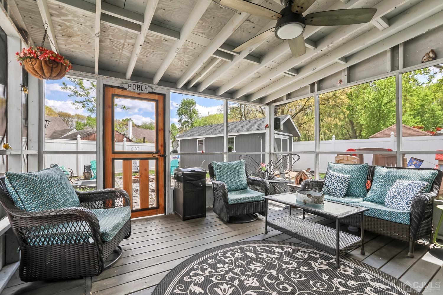 26 Sunrise Road Old Bridge, NJ 08857 - Photo 27 of 33 a outdoor living space with furniture and a rug