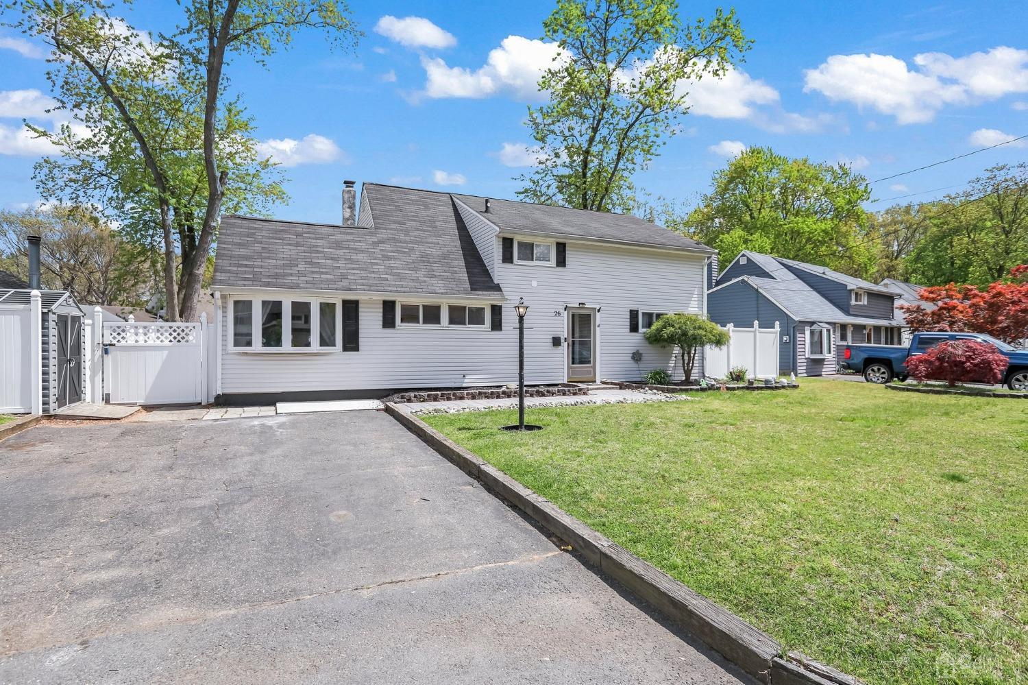 26 Sunrise Road Old Bridge, NJ 08857 - Photo 3 of 33 a front view of a house with garden