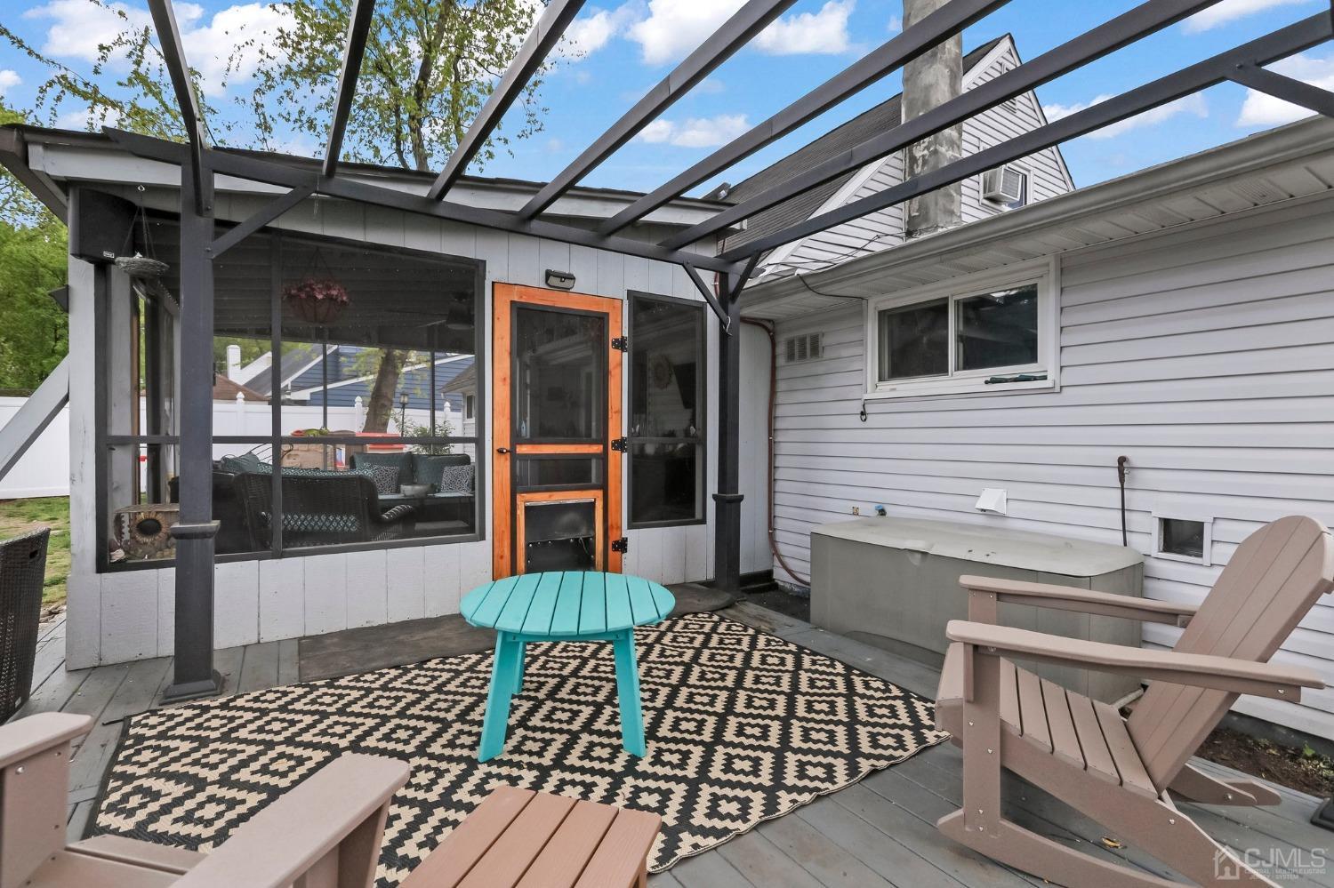 26 Sunrise Road Old Bridge, NJ 08857 - Photo 32 of 33 a view of a chairs and table in the patio