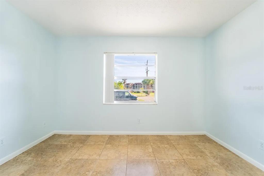1021 Apollo Beach Boulevard, Unit 6 Apollo Beach, FL 33572 - Photo 12 of 18 a view of an empty room with a window
