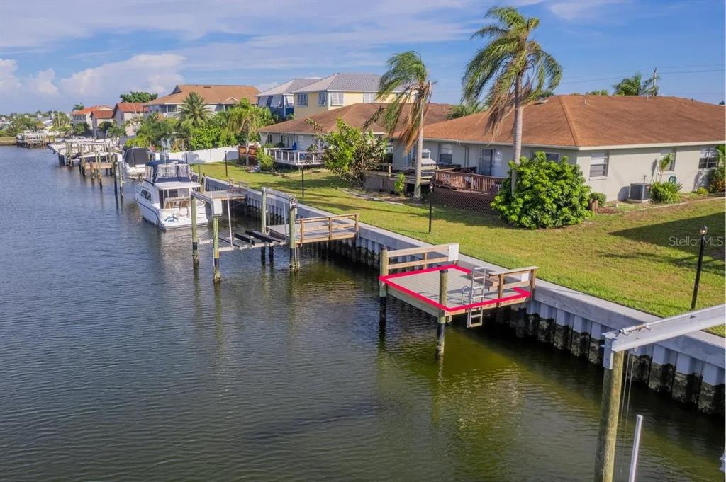 1021 Apollo Beach Boulevard, Unit 6 Apollo Beach, FL 33572 - Photo 13 of 18 a aerial view of a house with swimming pool having outdoor seating