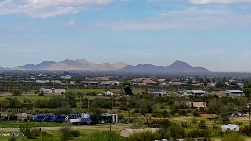 0 Huisatch Road Maricopa, AZ 85139 - Photo 13 of 27 a view of a town with mountains in the background