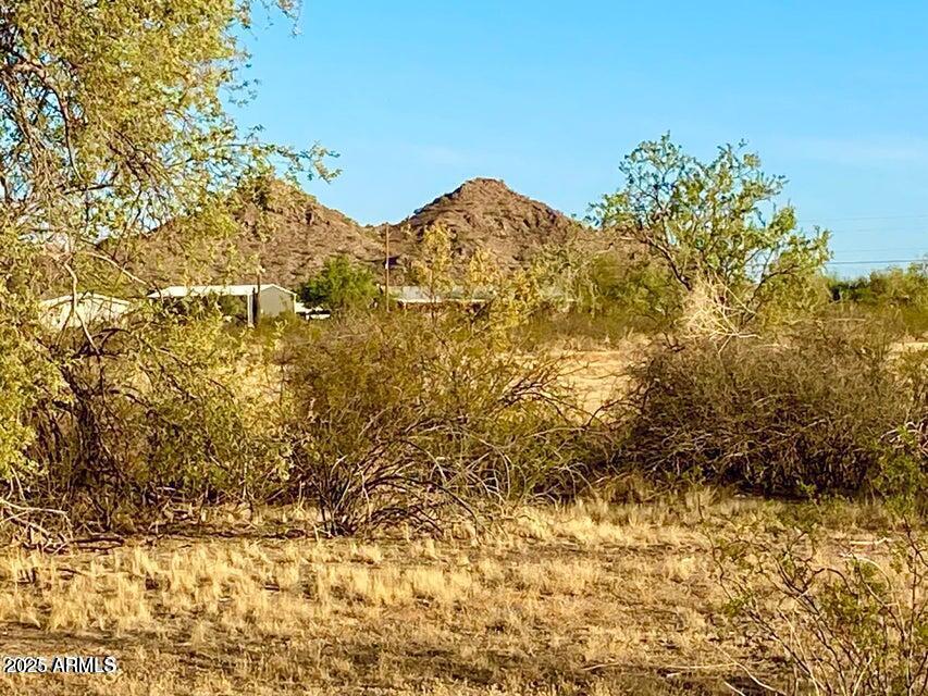 0 Huisatch Road Maricopa, AZ 85139 - Photo 17 of 27 a view of a large yard with wooden fence