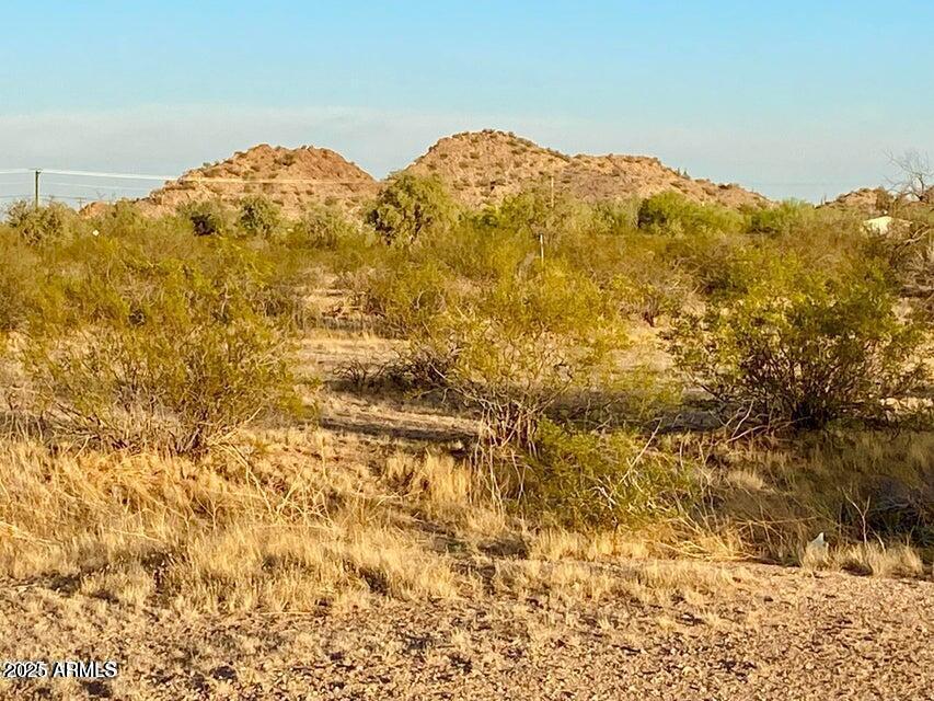 0 Huisatch Road Maricopa, AZ 85139 - Photo 27 of 27 a view of a large body of water and mountain