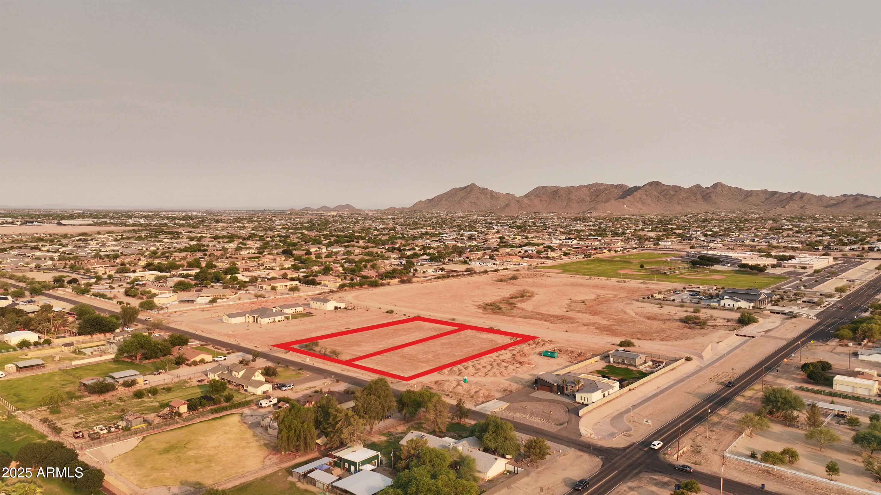 19215 East Cloud Road, Unit 2A Queen Creek, AZ 85142 - Photo 22 of 30 an aerial view of residential houses with outdoor space