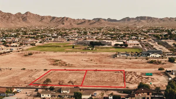 an aerial view of a tennis ground