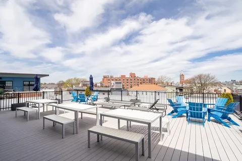 a view of a terrace with seating area