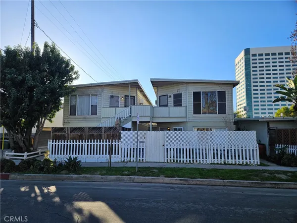 a view of a house with a street