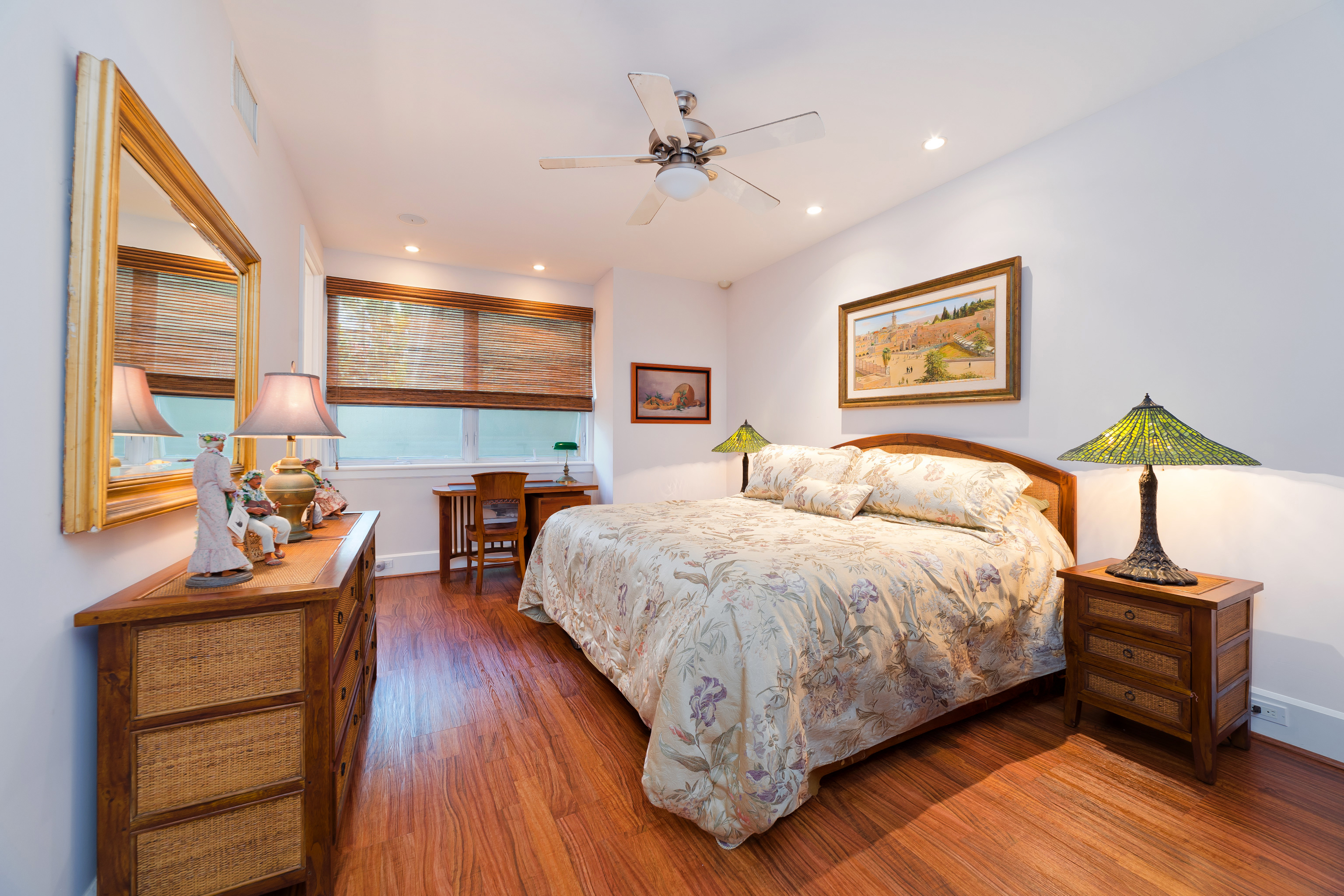 78-7018 Mololani Street Kailua-Kona, HI 96740 - Photo 12 of 30 a bedroom with a bed and wooden floor