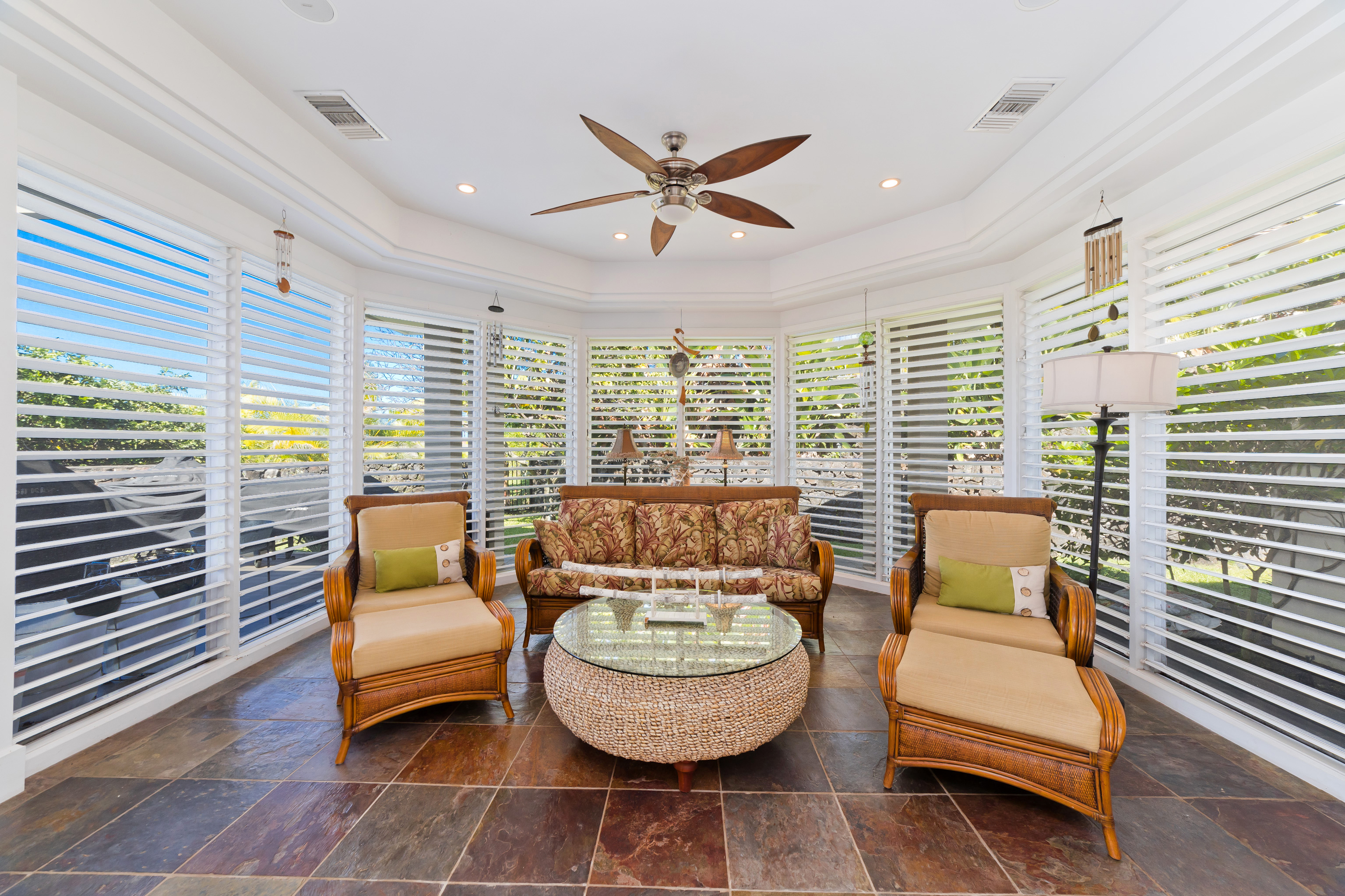 78-7018 Mololani Street Kailua-Kona, HI 96740 - Photo 20 of 30 a living room with furniture and a large window