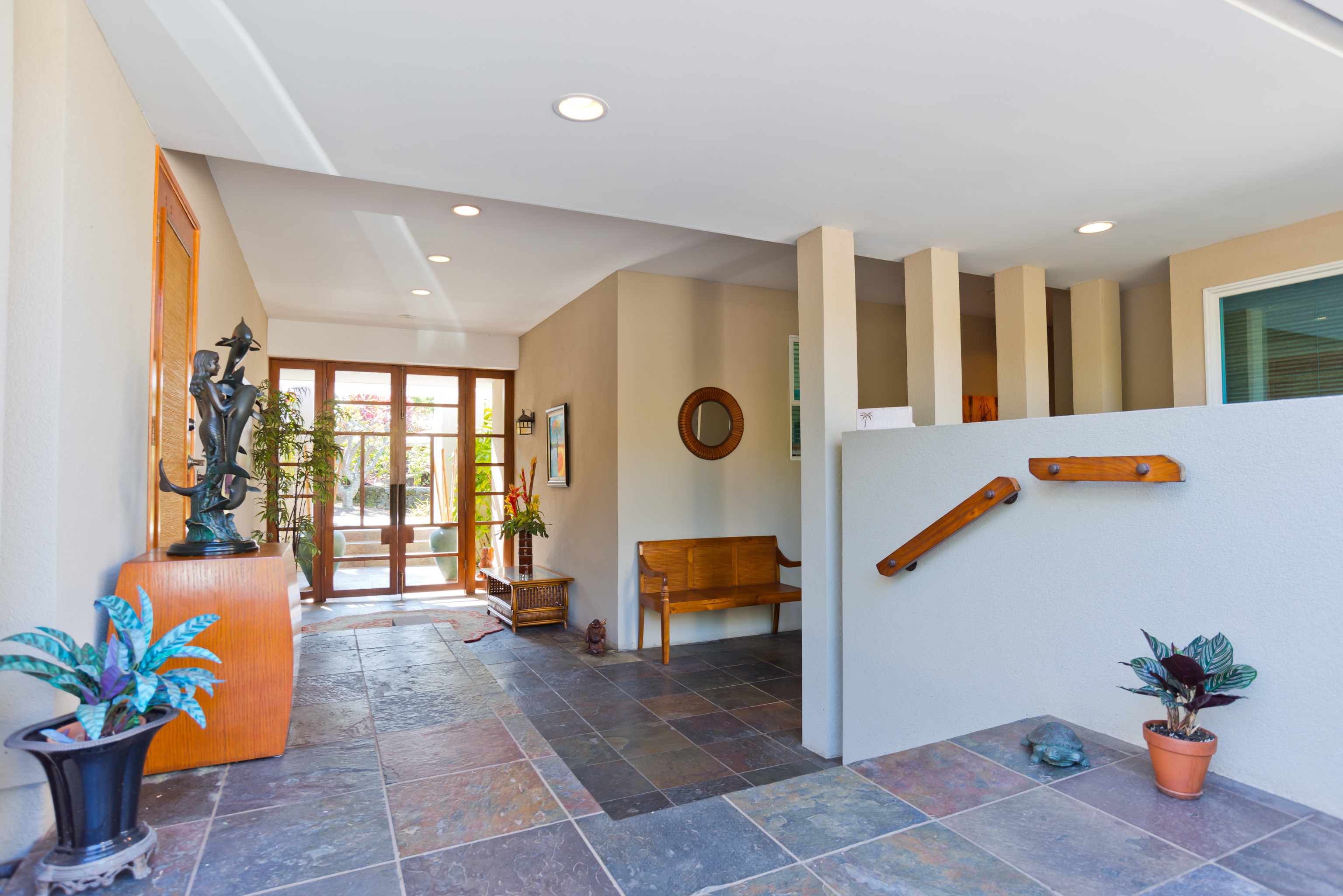 78-7018 Mololani Street Kailua-Kona, HI 96740 - Photo 2 of 30 a living room with furniture and a potted plant