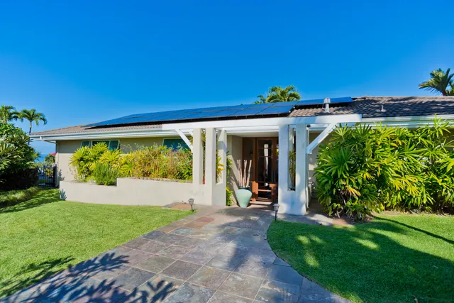 a view of a patio with furniture and a patio