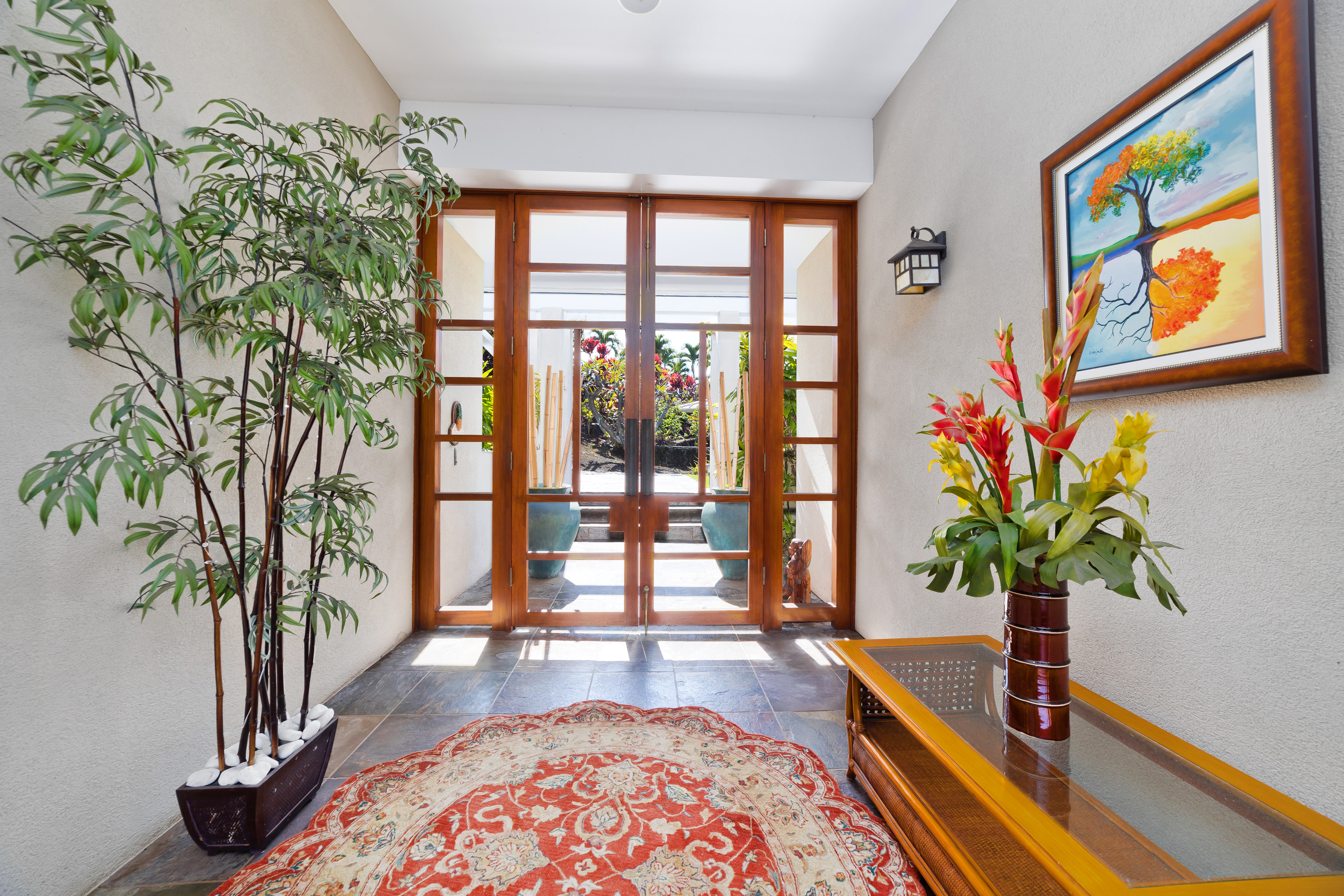 78-7018 Mololani Street Kailua-Kona, HI 96740 - Photo 3 of 30 a living room filled with furniture and a potted plant
