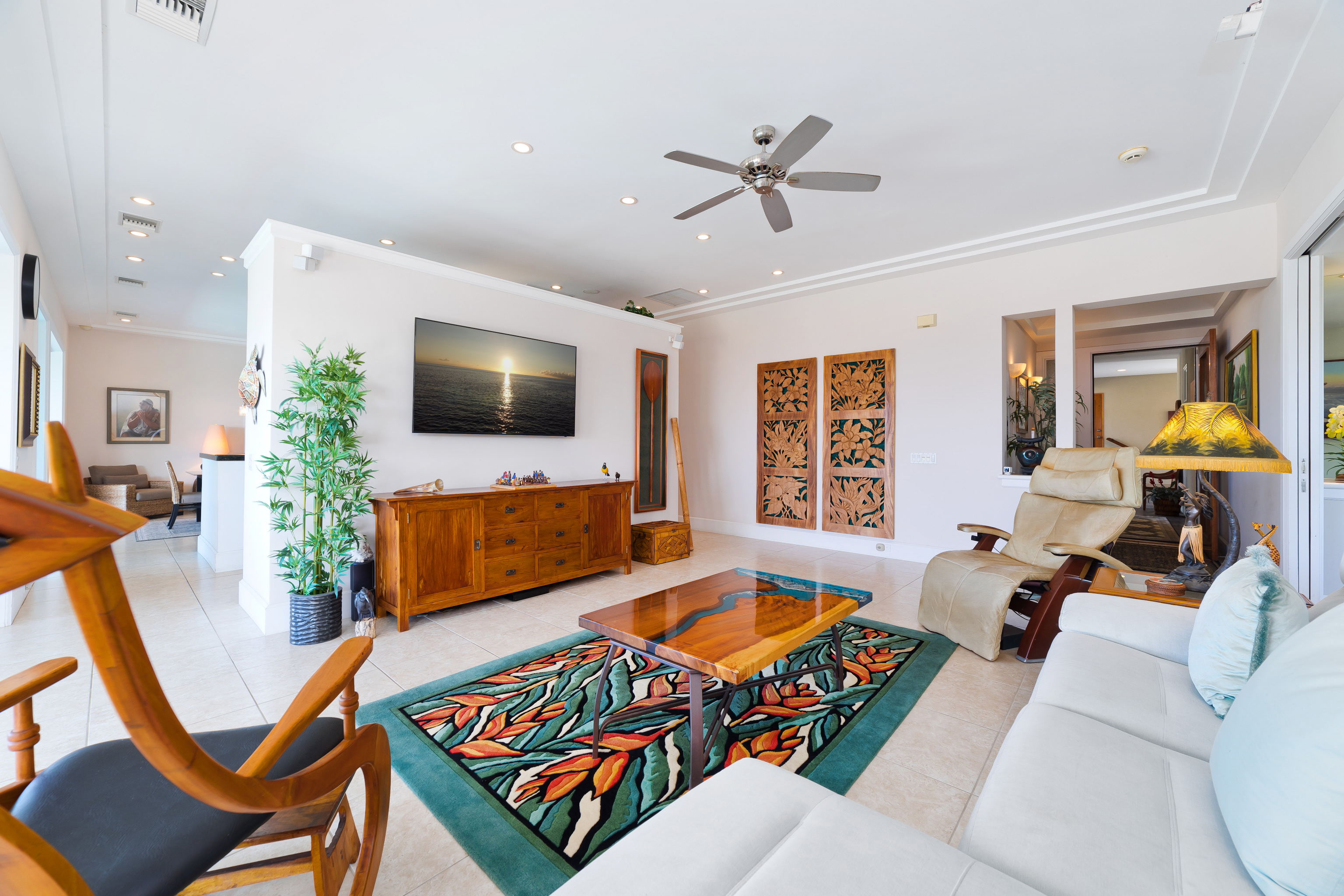 78-7018 Mololani Street Kailua-Kona, HI 96740 - Photo 5 of 30 a living room with furniture and a flat screen tv