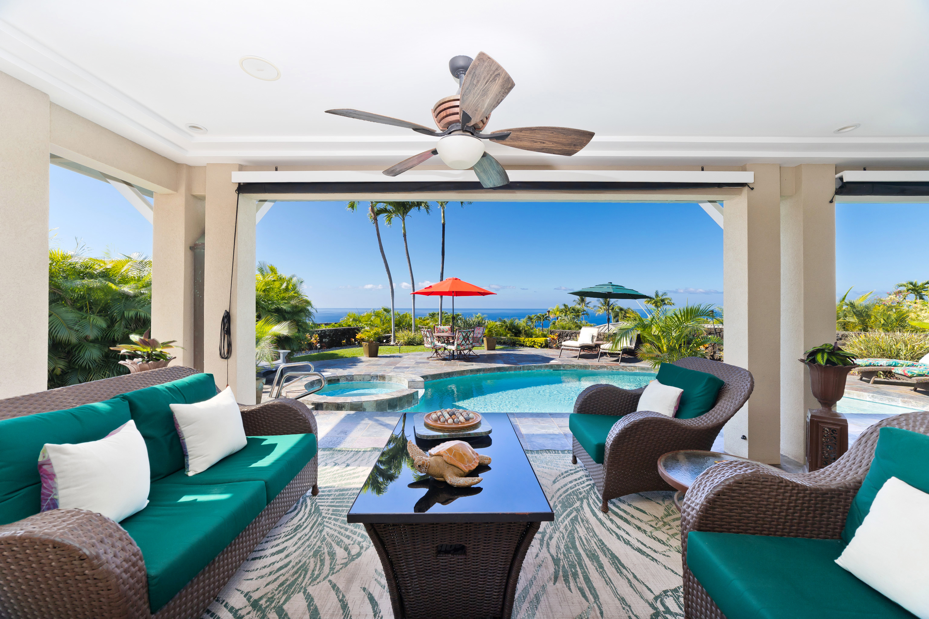 78-7018 Mololani Street Kailua-Kona, HI 96740 - Photo 6 of 30 a living room with furniture fireplace and window