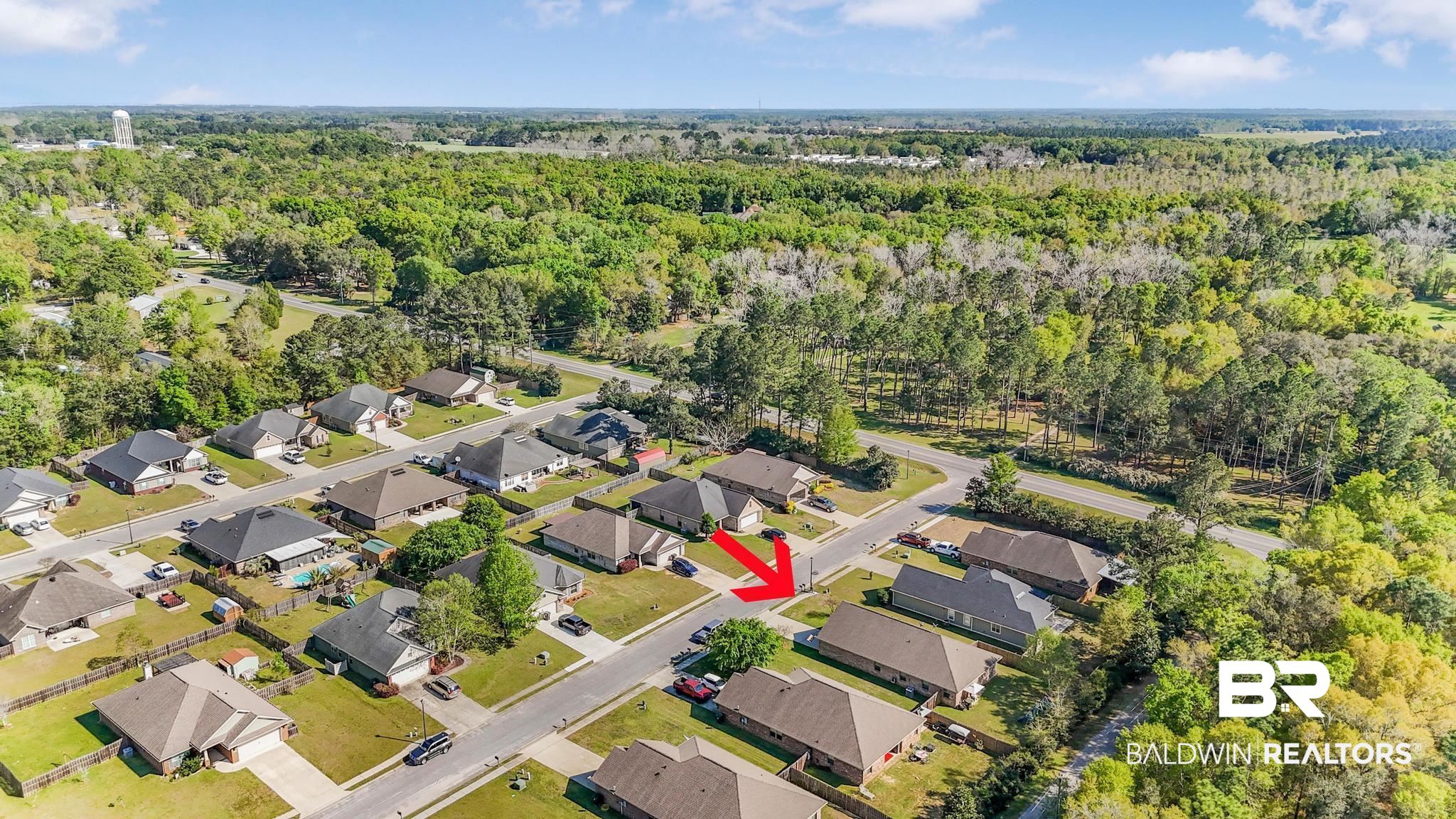 22043 Garland Loop Silverhill, AL 36576 - Photo 37 of 41 Aerial perspective of suburban area featuring a heavily wooded area