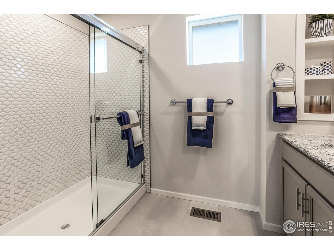 6101 Sublette Road Timnath, CO 80547 - Photo 23 of 34 a bathroom with a tub and shower