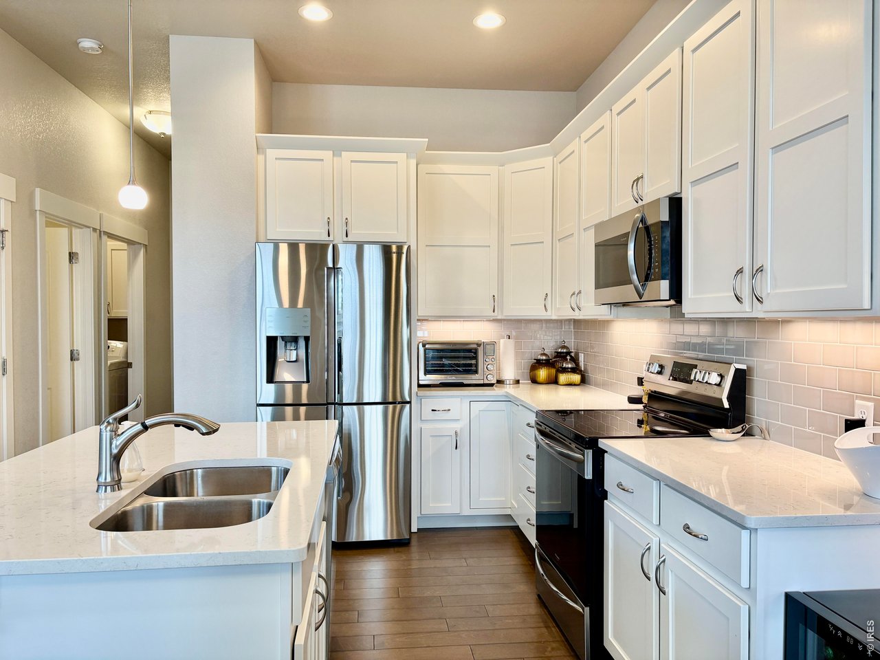 6316 Pumpkin Ridge Drive, Unit 1 Windsor, CO 80550 - Photo 1 of 50 Kitchen