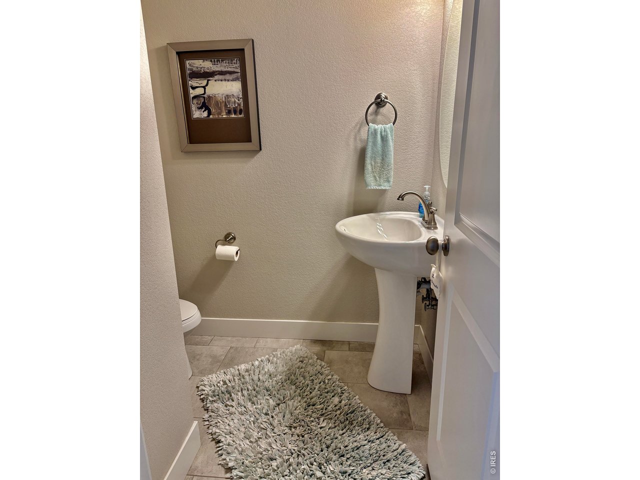 6316 Pumpkin Ridge Drive, Unit 1 Windsor, CO 80550 - Photo 13 of 50 Powder Room - Main Floor