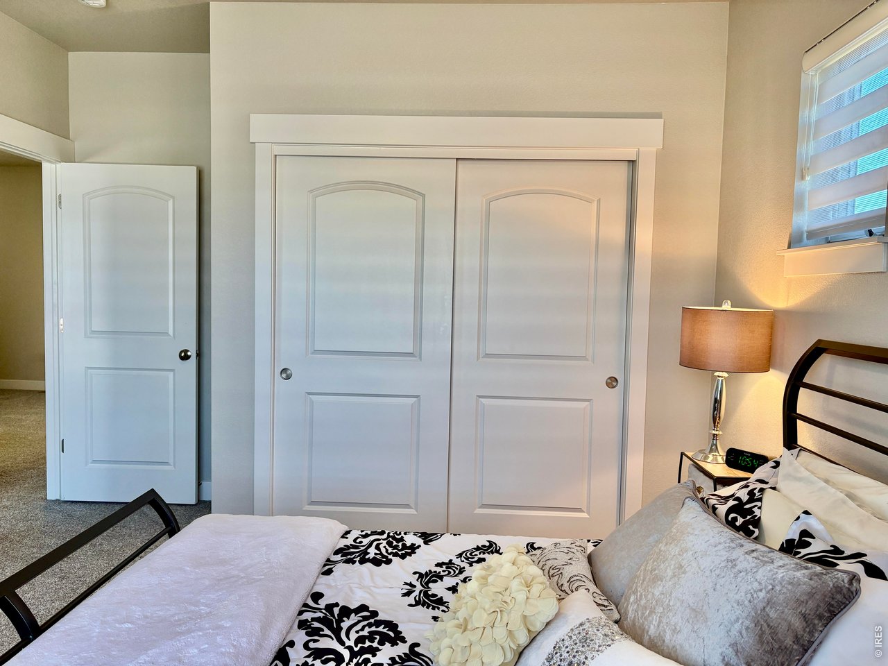 6316 Pumpkin Ridge Drive, Unit 1 Windsor, CO 80550 - Photo 17 of 50 Upstairs Bedroom 2
