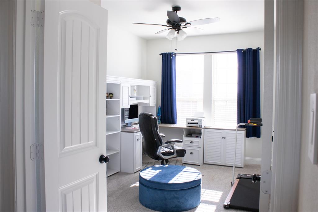 642 Sandiford Court Mansfield, TX 76063 - Photo 20 of 40 a living room with furniture and a window
