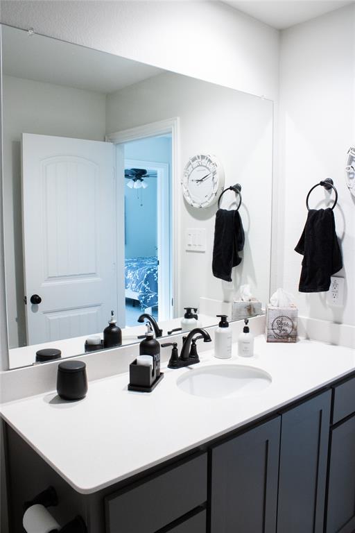 642 Sandiford Court Mansfield, TX 76063 - Photo 28 of 40 a bathroom with a sink and a mirror