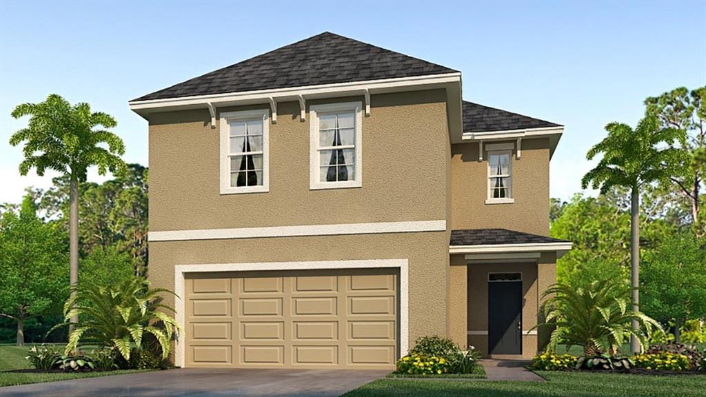 9177 Forge Breeze Loop Wesley Chapel, FL 33545 - Photo 1 of 1 a front view of a house with garden