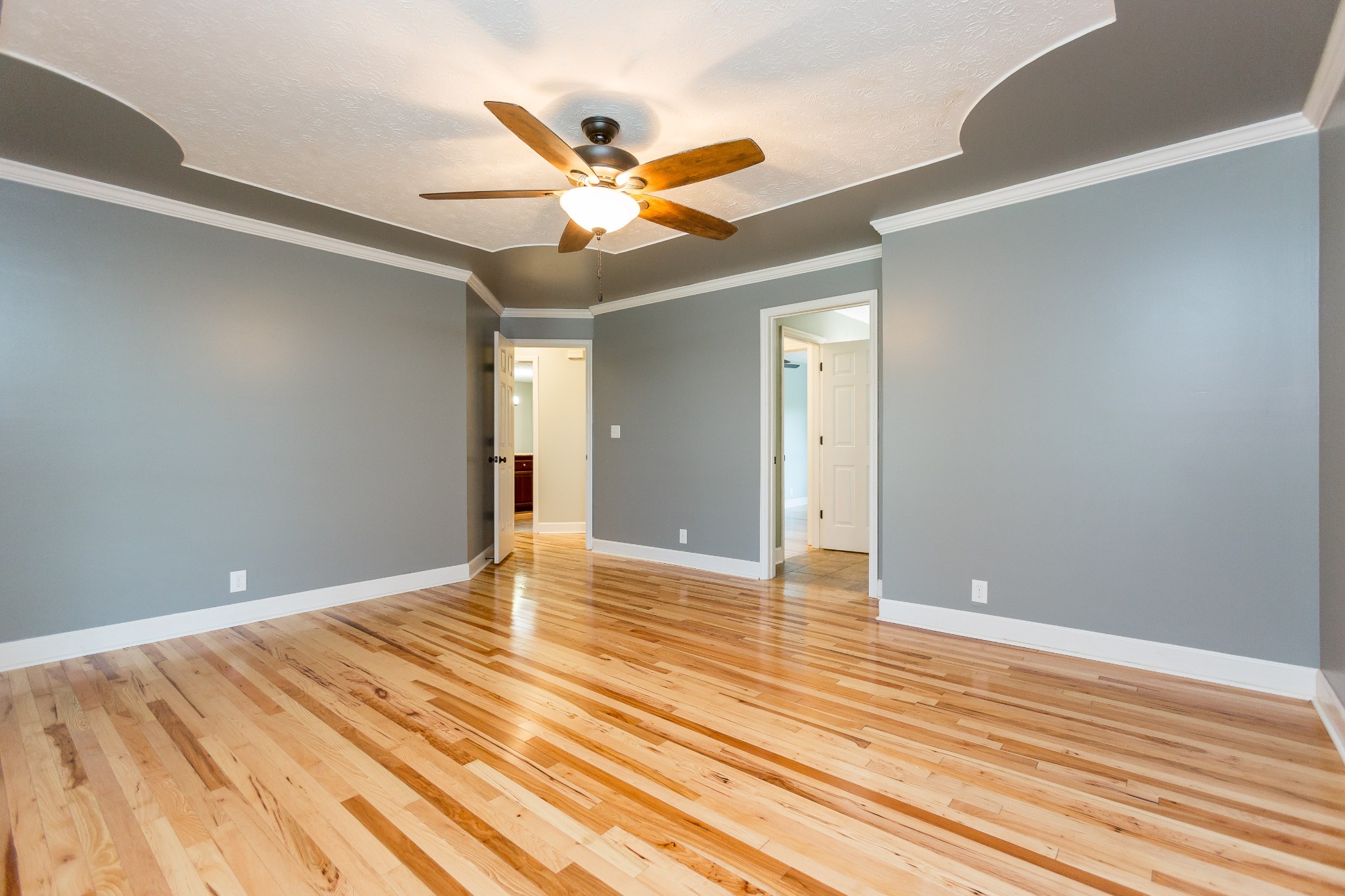 357 Blue Door Road Portland, TN 37148 - Photo 16 of 46 a view of an empty room with wooden floor and a window