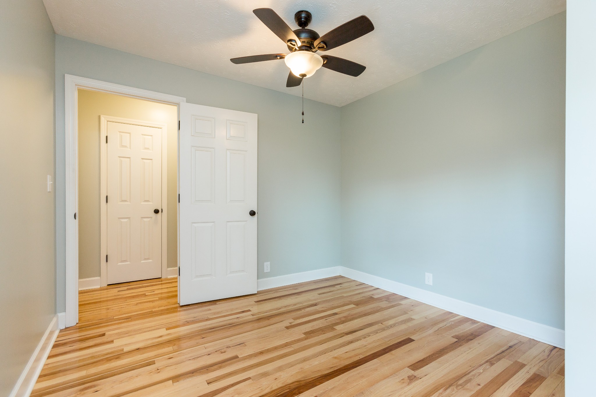 357 Blue Door Road Portland, TN 37148 - Photo 19 of 46 a view of empty room with wooden floor