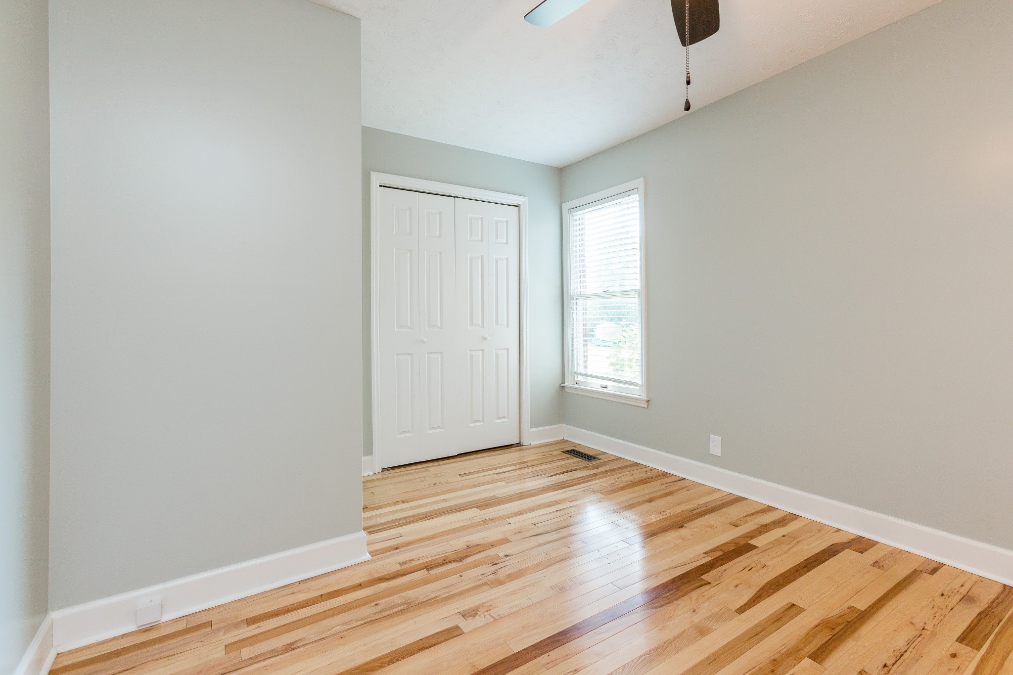 357 Blue Door Road Portland, TN 37148 - Photo 20 of 46 a view of empty room with wooden floor