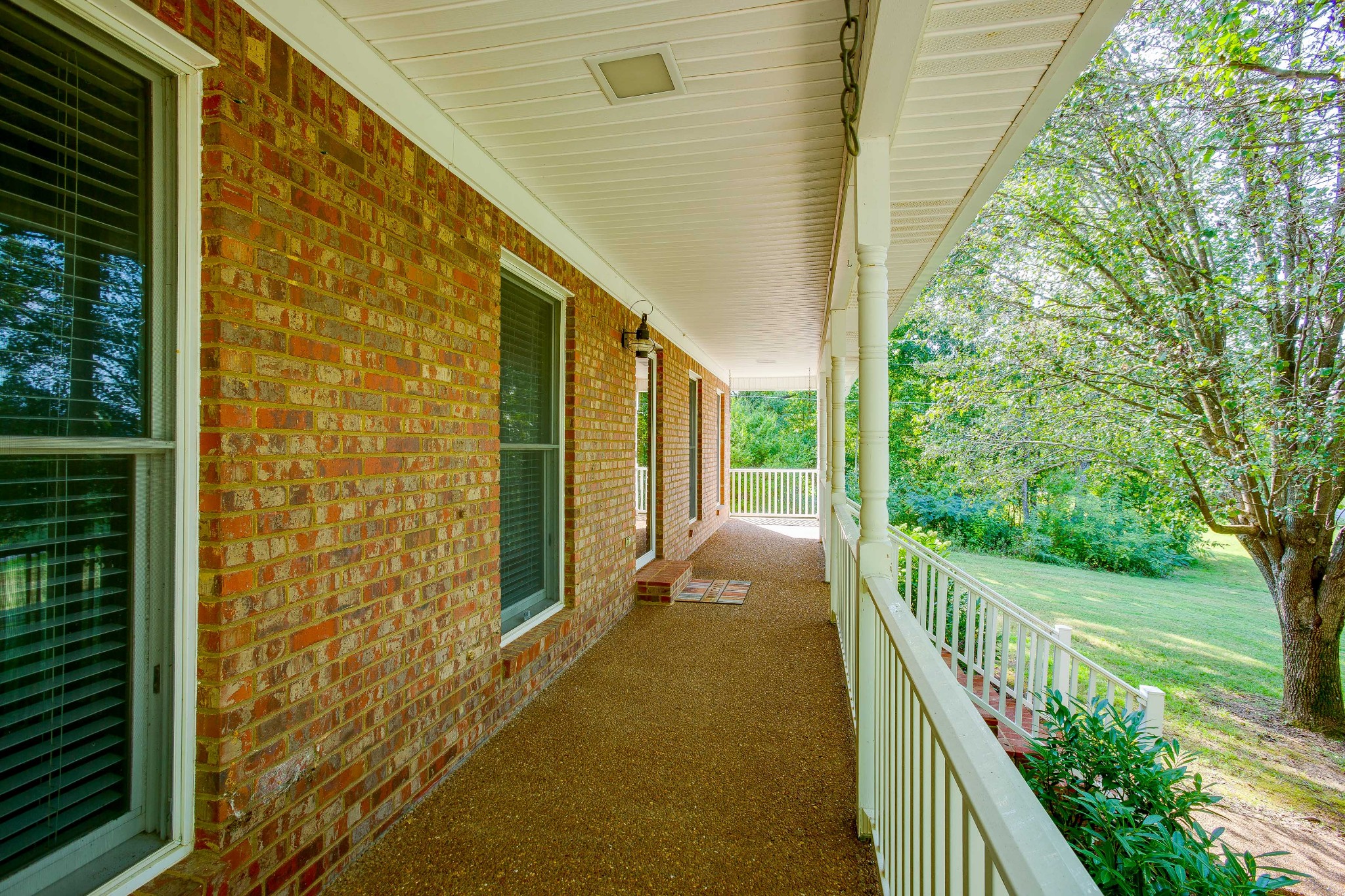 357 Blue Door Road Portland, TN 37148 - Photo 3 of 46 a view of a pathway of a building from a balcony