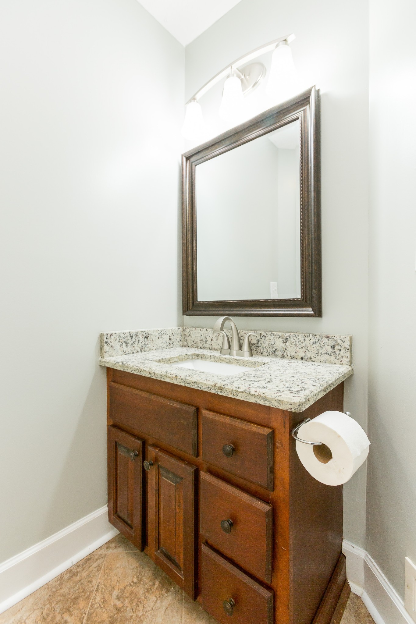357 Blue Door Road Portland, TN 37148 - Photo 27 of 46 a bathroom with a sink and a mirror
