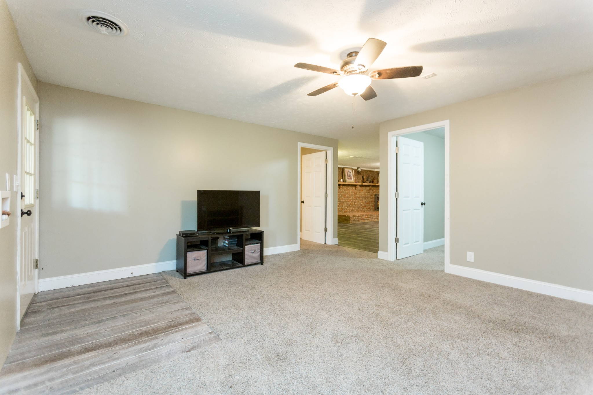 357 Blue Door Road Portland, TN 37148 - Photo 28 of 46 a view of livingroom with furniture and chandelier fan