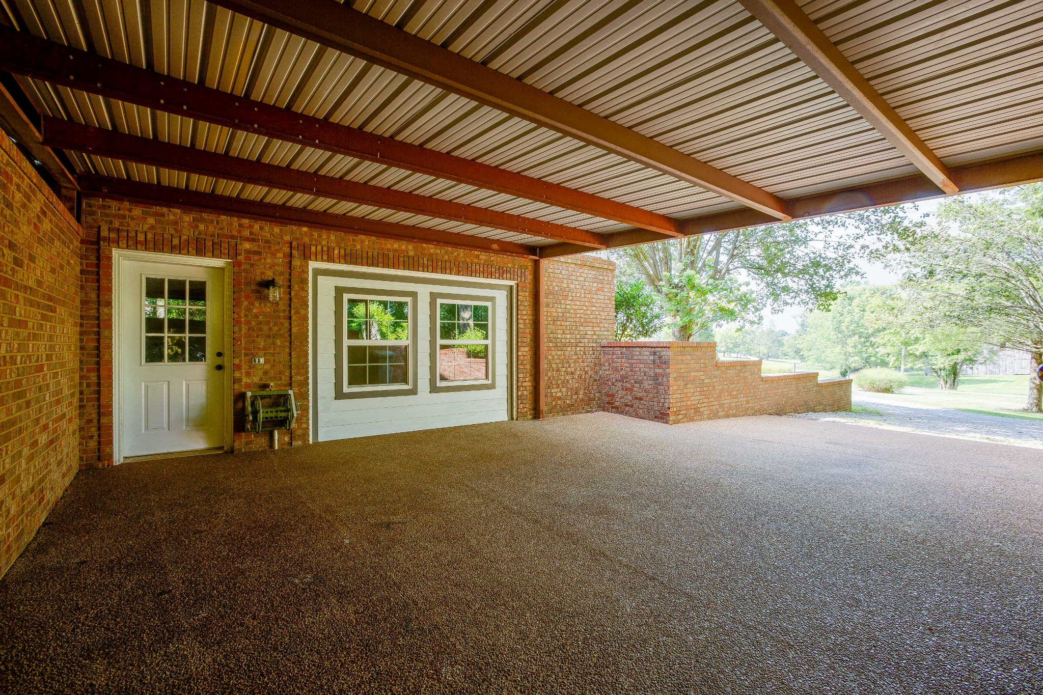 357 Blue Door Road Portland, TN 37148 - Photo 40 of 46 a view of a porch next to a yard