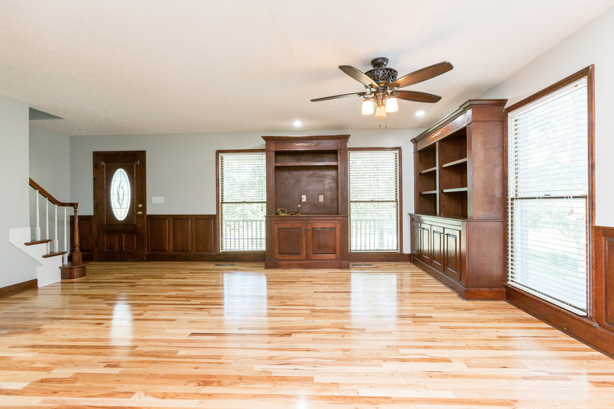 357 Blue Door Road Portland, TN 37148 - Photo 5 of 46 a view of an empty room with window and wooden floor