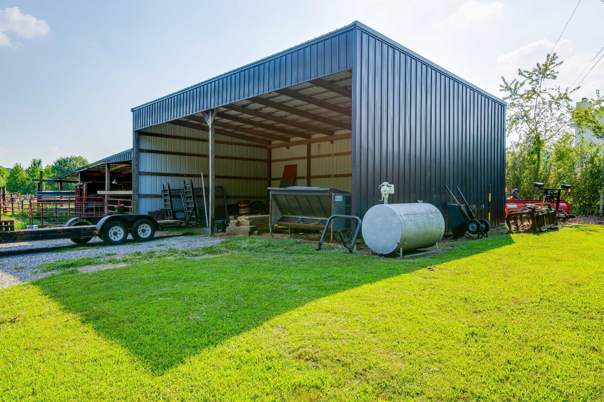 357 Blue Door Road Portland, TN 37148 - Photo 43 of 46 a view of front door of house with outdoor seating