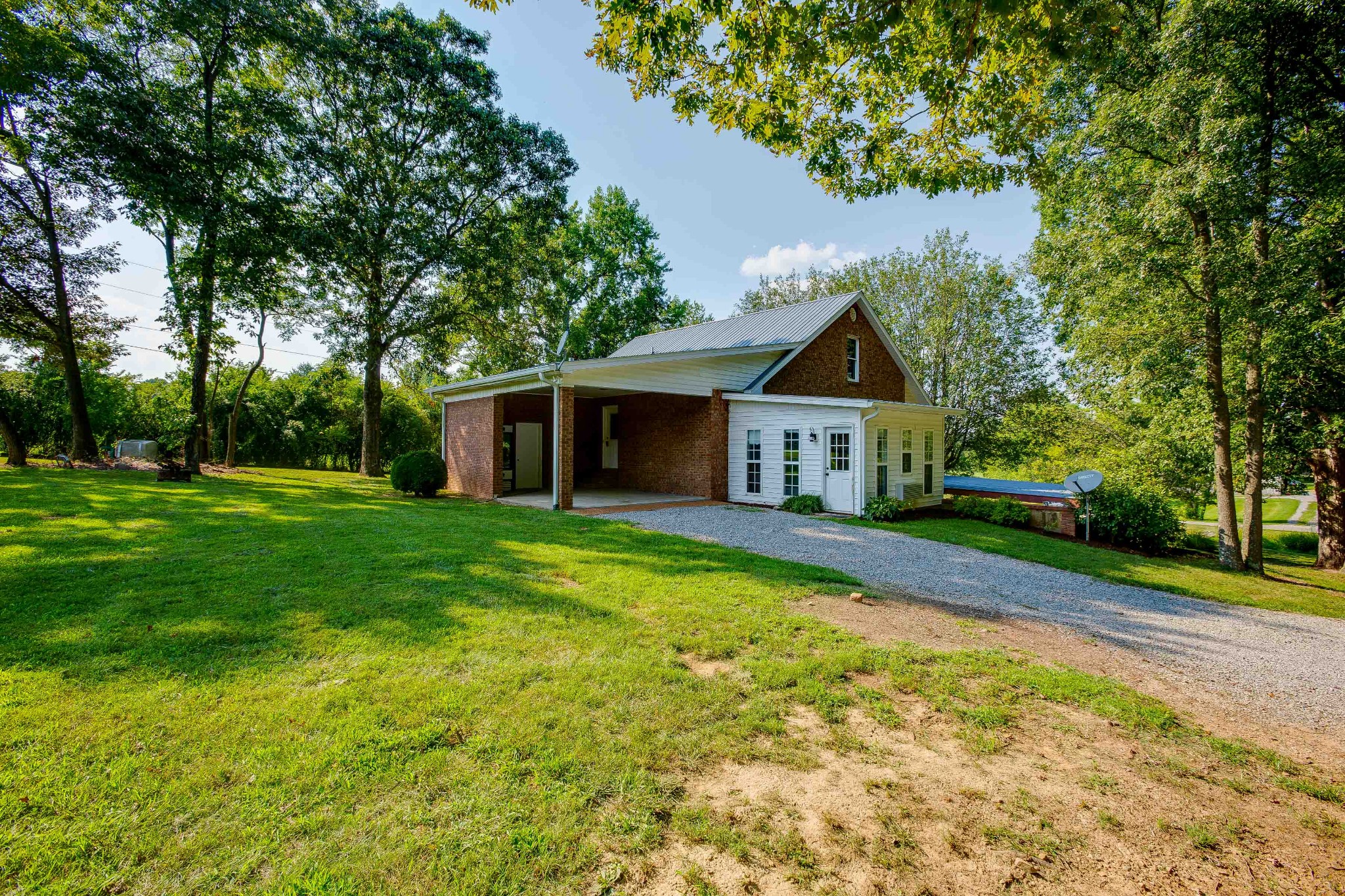 357 Blue Door Road Portland, TN 37148 - Photo 46 of 46 a front view of house with yard and green space