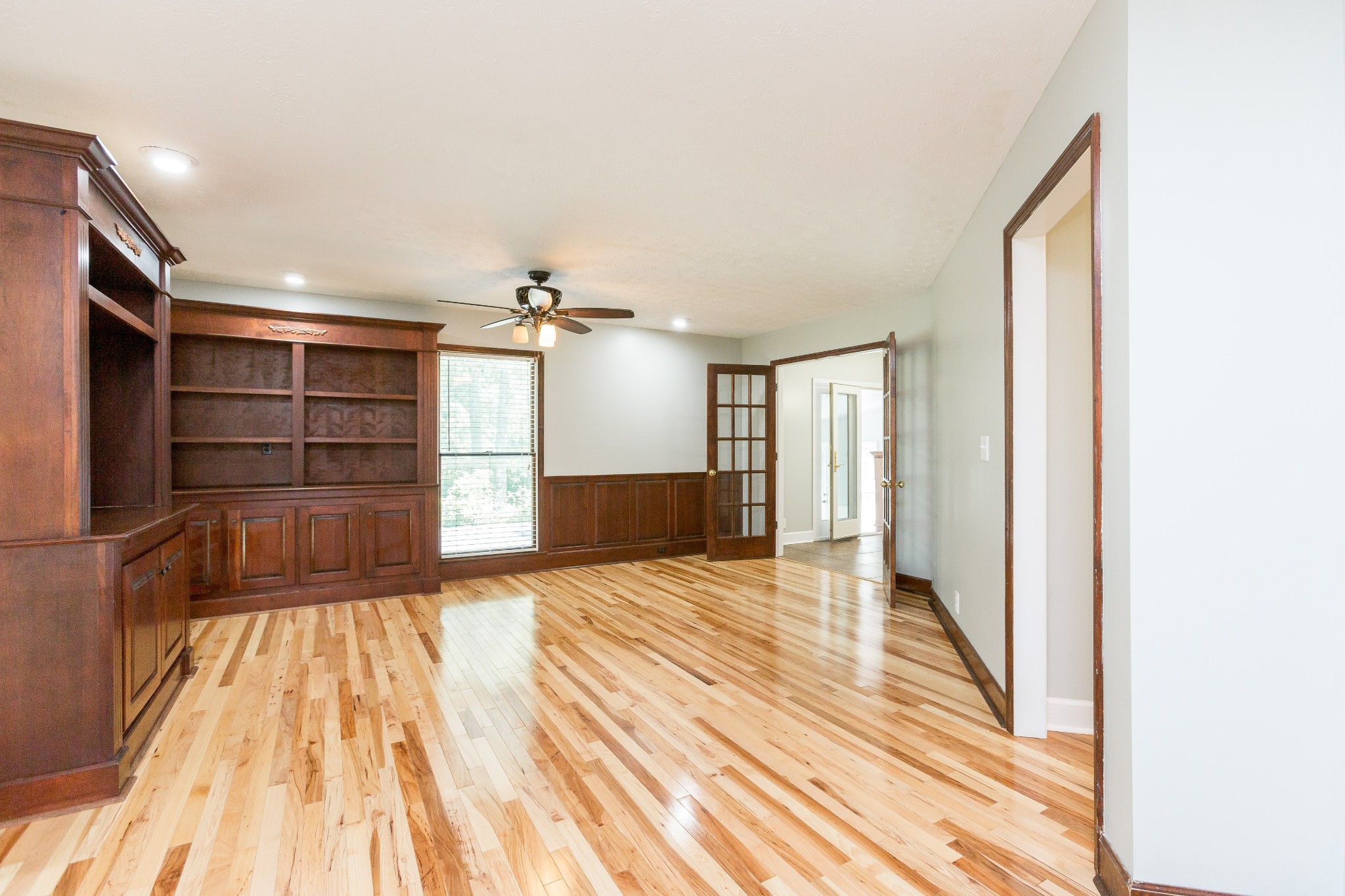 357 Blue Door Road Portland, TN 37148 - Photo 6 of 46 a view of empty room with wooden floor and window
