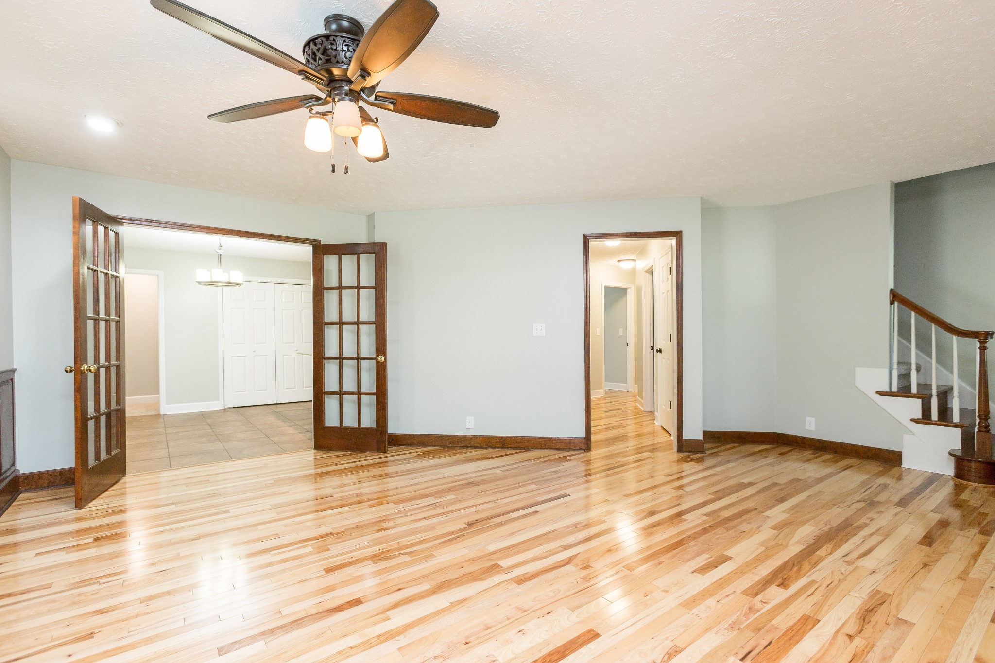 357 Blue Door Road Portland, TN 37148 - Photo 7 of 46 a view of an empty room with wooden floor
