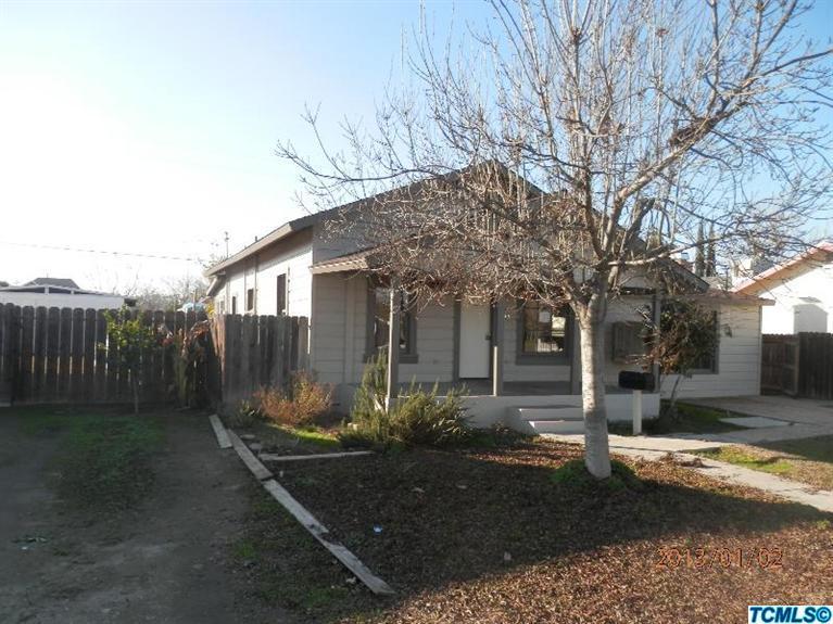 240 South Filbert Road Exeter, CA 93221 - Photo 2 of 10 a front view of a house with garden