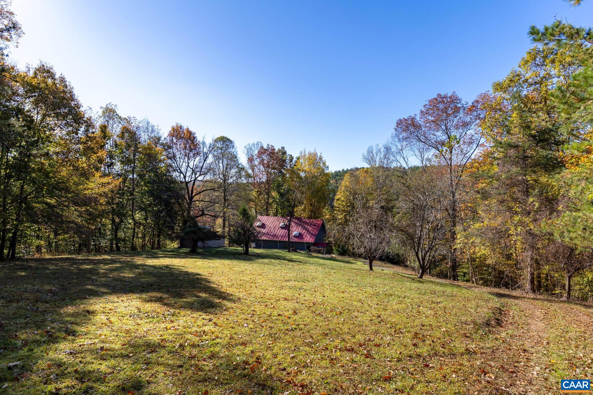 9712 Old Green Mountain Road Esmont, VA 22937 - Photo 12 of 42 a view of a playground with basketball court
