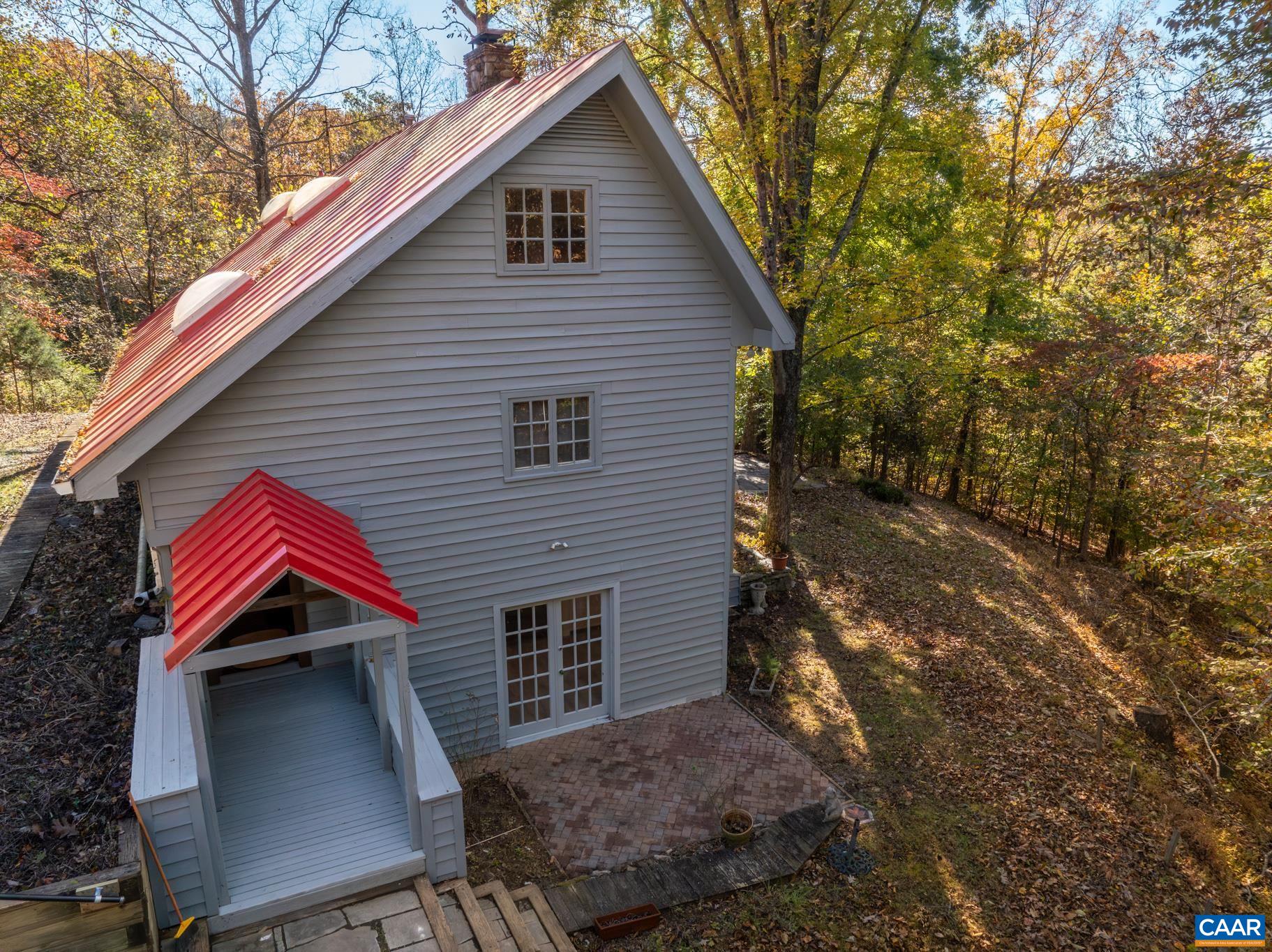 9712 Old Green Mountain Road Esmont, VA 22937 - Photo 13 of 42 a view of house with a yard
