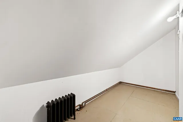 a spacious bathroom with a bathtub and a shower