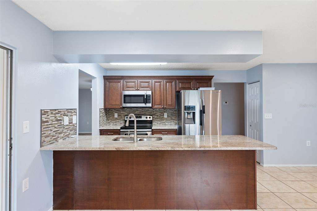 8215 Lora Del Rio Drive Port Richey, FL 34668 - Photo 10 of 35 Gallery Image 10