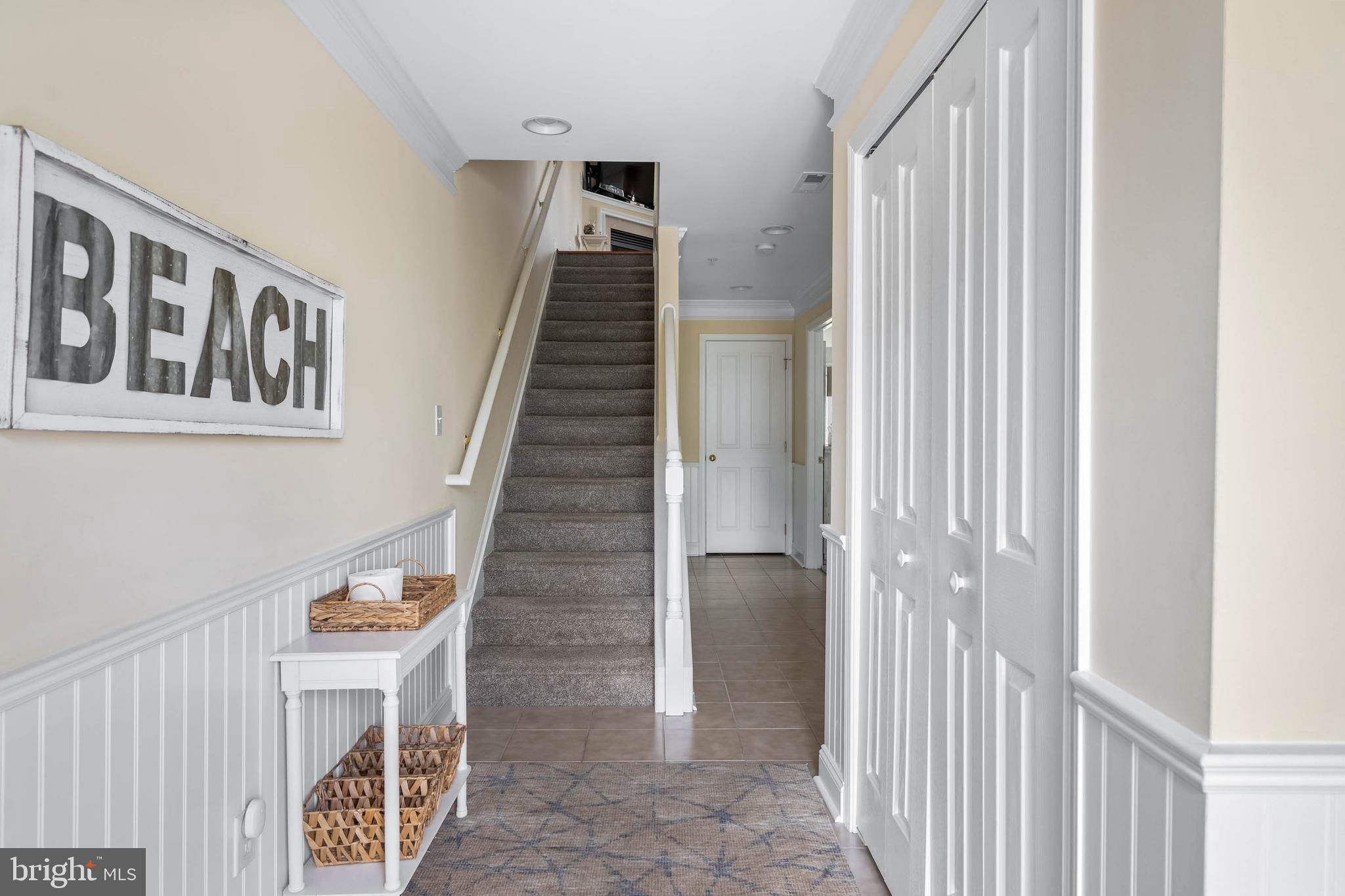 19901 Ames Drive, Unit 133 Rehoboth Beach, DE 19971 - Photo 4 of 34 a view of a hallway with entryway