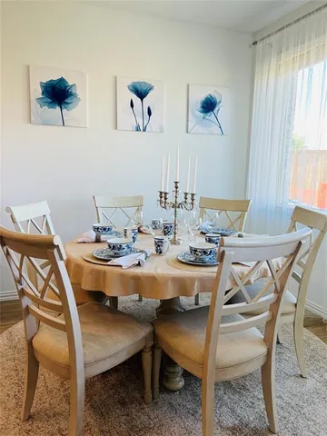 a view of a dining room with furniture