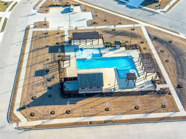 a view of swimming pool with a bathtub