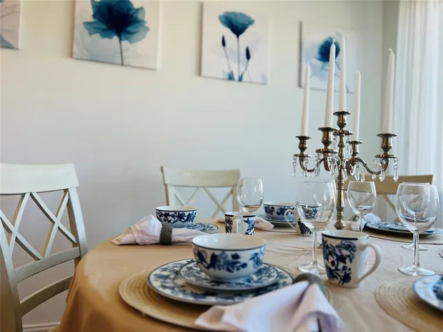 a view of a dining room with furniture