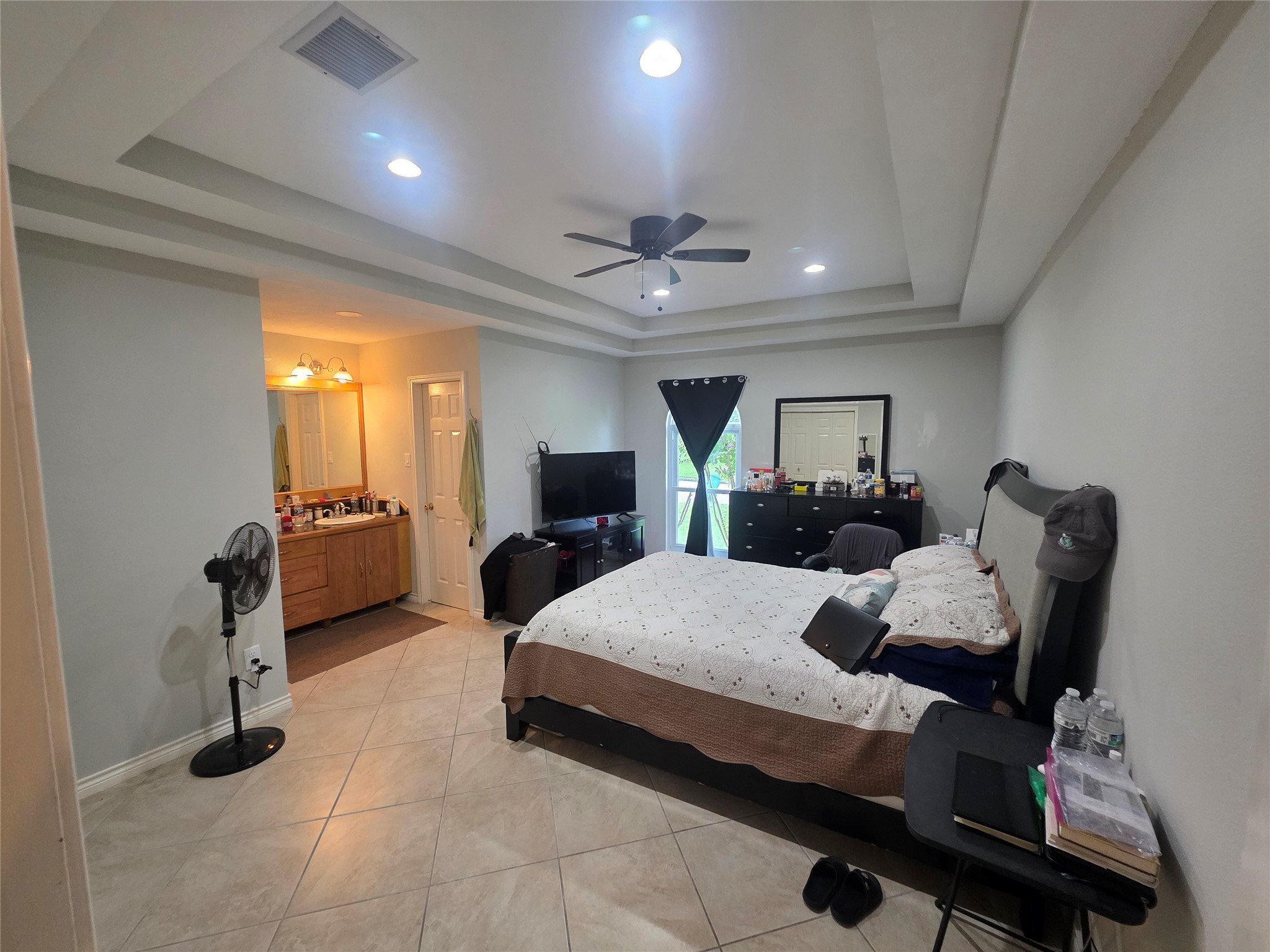 12531 La Rochelle Drive Houston, TX 77015 - Photo 4 of 15 a living room with furniture and a flat screen tv